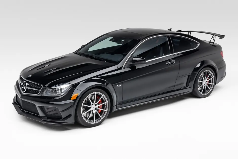 Photo of a C63 AMG Black Series showing the wide body, aggressive aero, and rear wing