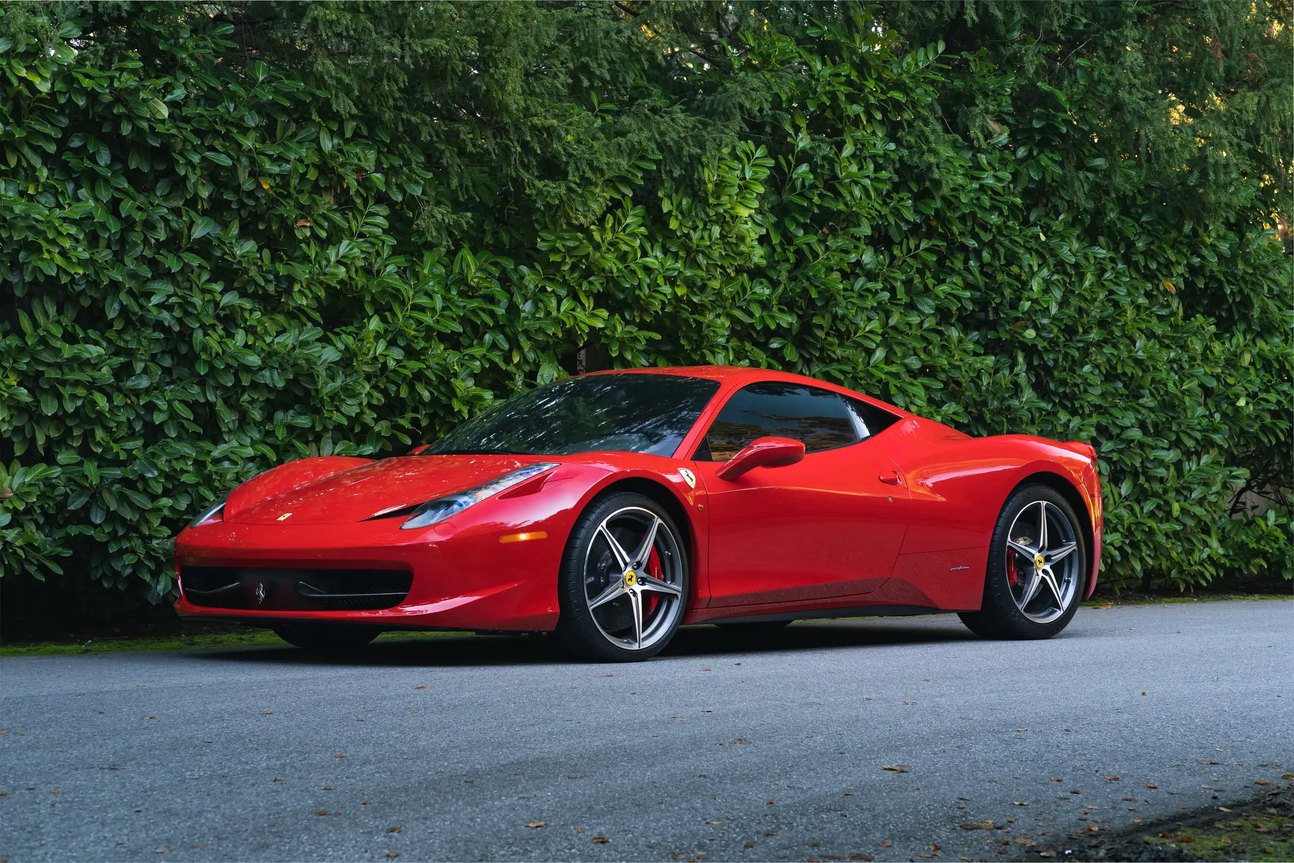 Ferrari 458 Italia in Rosso Corsa photographed from a front three-quarter angle