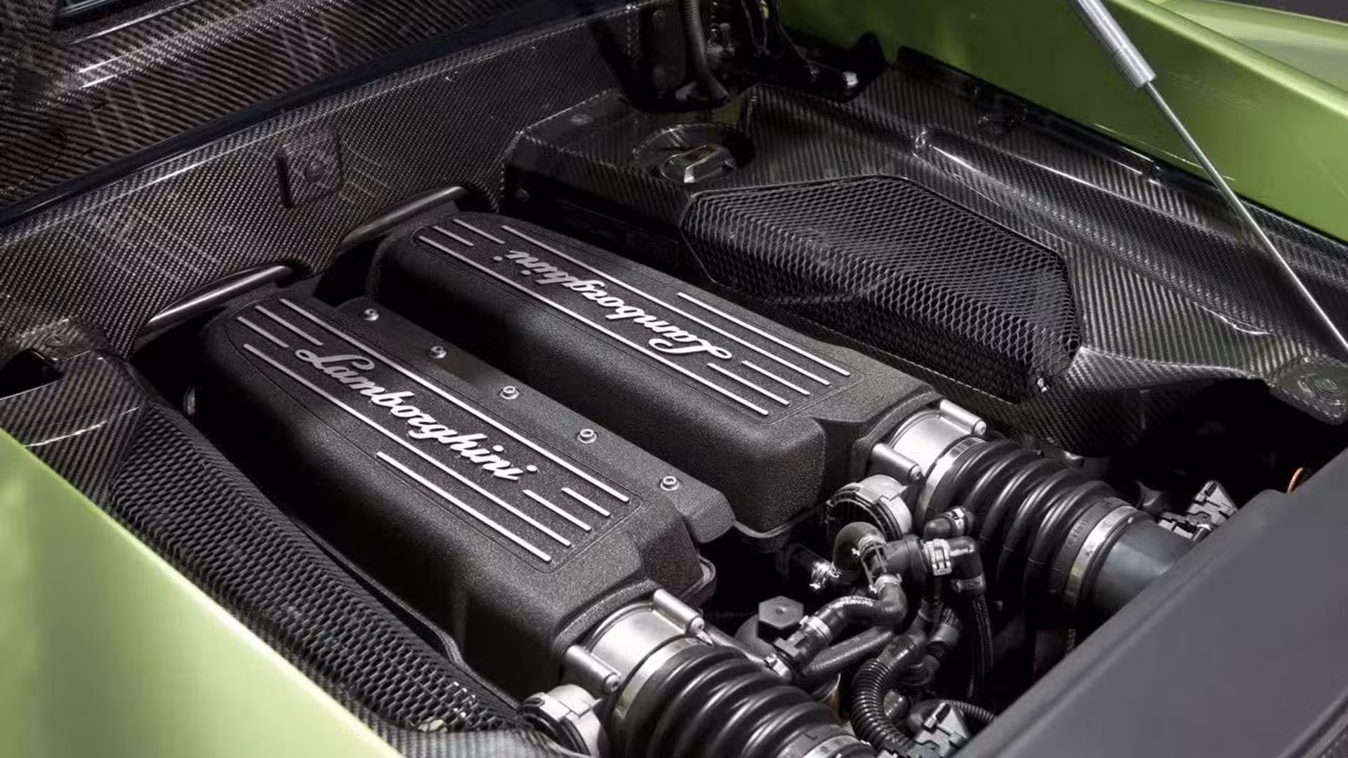 Engine bay shot (or service shot) of a Gallardo V10 with clear view of intake runners and surrounding components