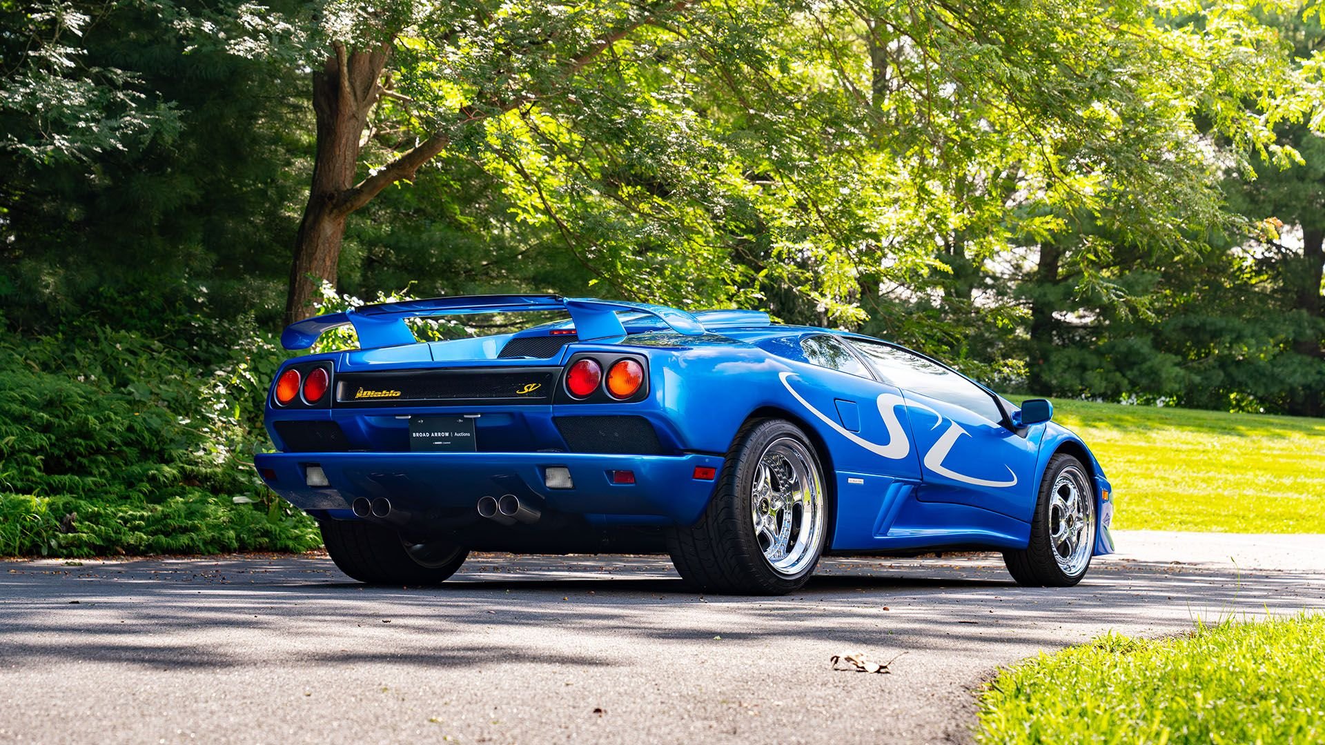 Rear view detail of a Lamborghini Diablo SV showing taillights, rear vents, and exhaust outlets